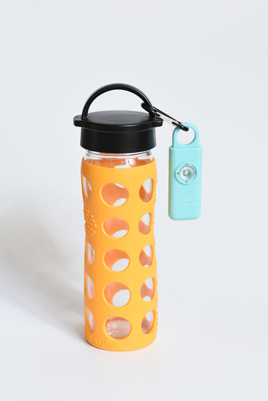 water bottle with orange sleeve with turquoise safety alarm attached with carabiner loop